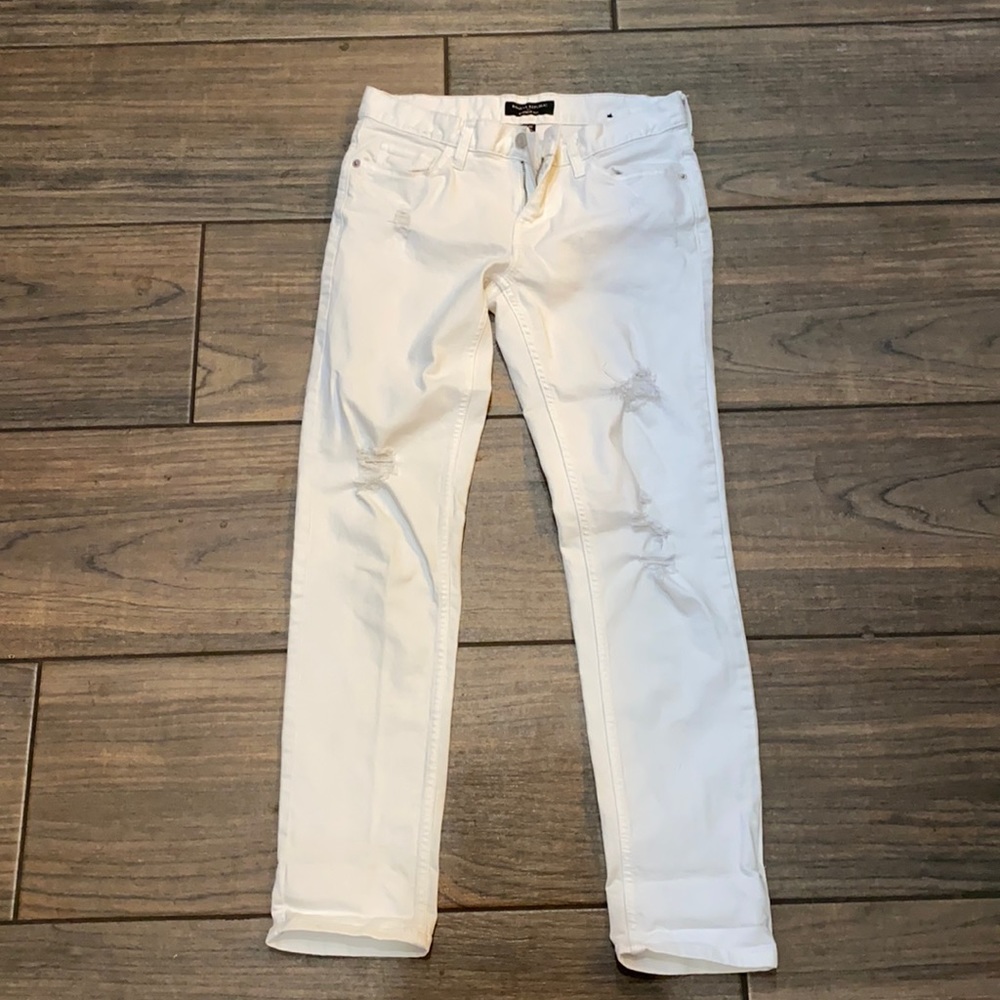 Distressed, ripped white skinny jeans